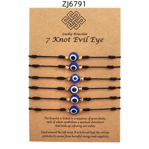 Set di 6 braccialetti Evil Eye neri intrecciati con perline dorate su scheda prodotto