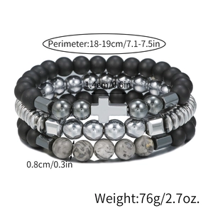 Detailed view of three-piece men's beaded bracelet set featuring a metal cross and stone beads