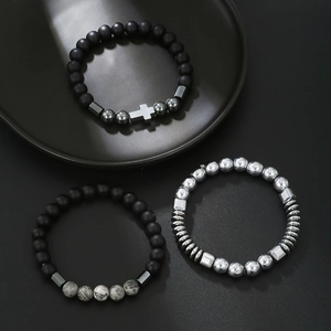 Men's beaded bracelet set with black matte stones, cross pendant and silver metal accents