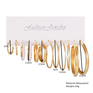 6-piece geometric gold earring set with pearls and textured hoops in various sizes