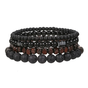 Set of four stacked bracelets with black lava rock matte beads and wooden squares