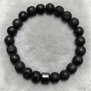 Black volcanic lava stone bead bracelet with a polished metal cylinder for men