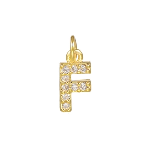Detail of 14k gold plated letter F pendant with micro-paved cubic zirconia crystals
