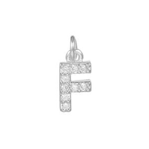 Macro detail of letter F pendant with micro-paved clear zircons in silver finish