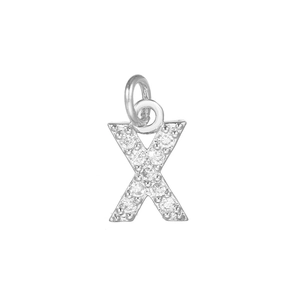 Detail of silver letter X pendant with micro-pave zircons and 18k gold plated ring