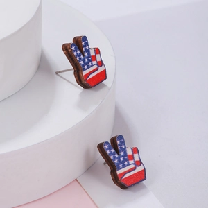 Macro view of V-shaped wooden studs with American flag patterns on a display stand