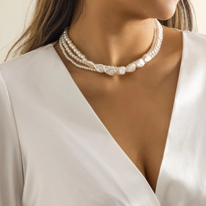 Three-layer Baroque faux pearl necklace with large irregular beads and smooth cream finish