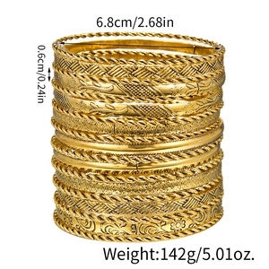 Detail view of 19pcs gold metal bangles showing dimensions 6.8cm inner diameter and weights