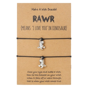 Braccialetti dei desideri dinosauro fatti a mano con cordino cerato nero su carta kraft