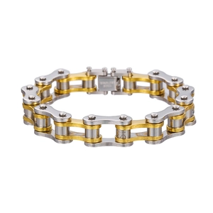 Dettaglio macro del bracciale a catena da bici bicolore in acciaio inox oro e argento