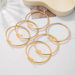 6-piece minimalist gold open bracelet set with adjustable thin metal rings for women