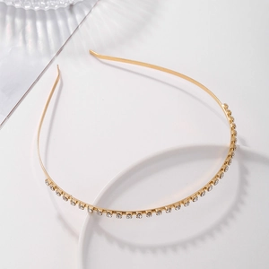 Eleganter goldener Metall-Haarreif mit funkelnden weißen Strasssteinen und Design