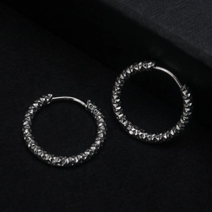 Polished silver stainless steel hoop earrings with geometric diamond-cut texture for unisex
