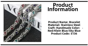 Detail of handmade stainless steel chain bracelet with colorful beads in blue and red