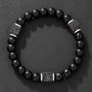 Mens obsidian beaded bracelet with square lava stones on black leather background