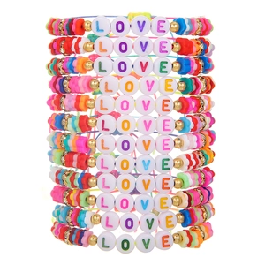 Colorful LOVE letter beaded bracelets with Heishi clay tiles and golden accents
