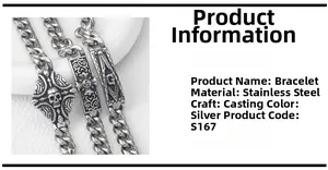 Macro detail of silver stainless steel bracelet featuring Masonic and skull emblems