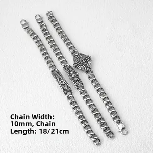 Detail showing 10mm punk cuban link bracelets with skull and masonic symbols