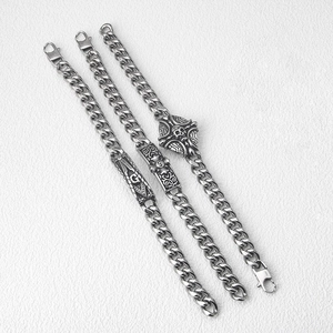 Mens stainless steel curb chain bracelet set featuring skull and masonic symbols