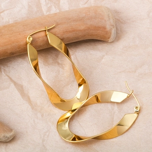 Modern gold twisted U-shaped stainless steel hoop earrings with high polish finish