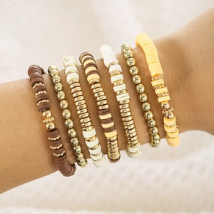 Detail of 7pcs bohemian stretch bracelet set with golden alloy and heishi beads