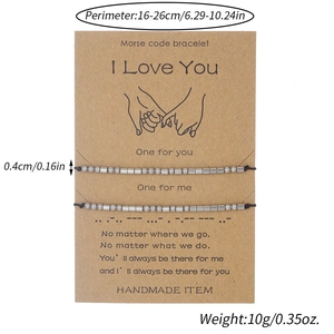 Detail of adjustable stainless steel bead bracelets on card with 16-26cm size specs