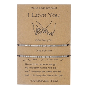 Morse code friendship bracelet set with silver beads on an 'I Love You' gift card
