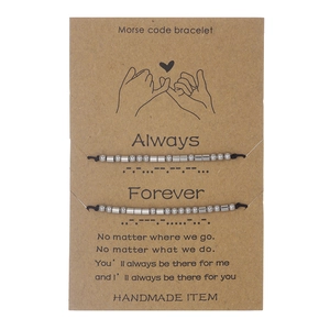 Detail of Morse code braided bracelets with Always and Forever message on gift card
