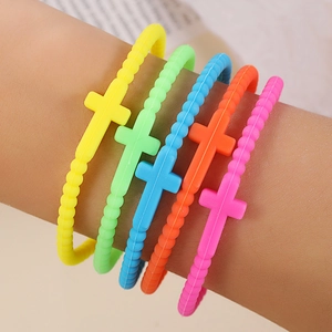 Colorful silicone cross bracelets set in yellow green blue orange and pink for kids and adults