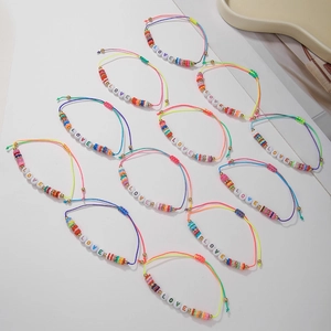 Colorful woven friendship bracelet with LOVE letter beads and adjustable rope closure