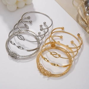 Set di bracciali rigidi boho vintage con nodi e design in metallo geometrico