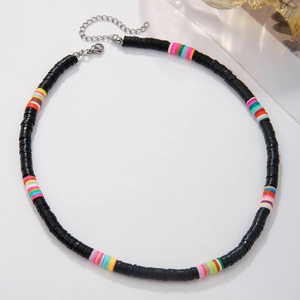 Detail of colorful rainbow heishi clay beads necklace with silver lobster clasp and chain