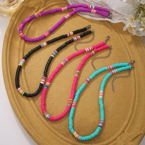 Handmade colorful heishi bead necklaces in summer beach style with four vibrant color sets