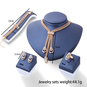 Gold plated crystal jewelry set with Y-shaped tassel necklace, earrings and ring