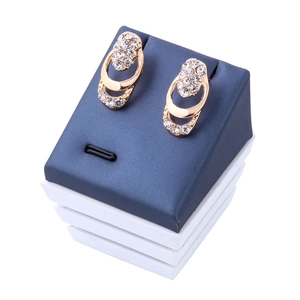 Gold-plated bridal jewelry set featuring oval crystal necklaces and matching stud earrings