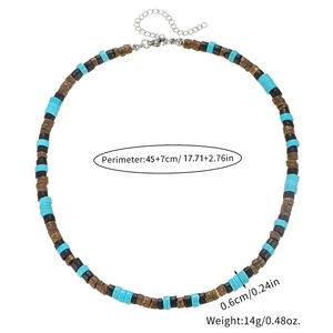 Detail of bohemian turquoise and coconut wood beaded necklace with lobster clasp