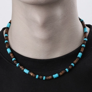 Men's bohemian beaded necklace featuring turquoise and brown coconut wood cylinder beads