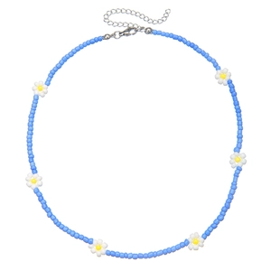 Handmade blue seed bead necklace with white daisy floral charms and adjustable silver clasp