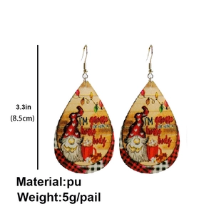 Detail of Christmas gnome teardrop earrings with dimensions 3.3 inches and 5g PU material