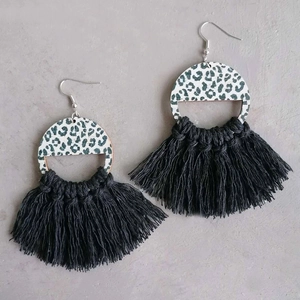 Bohemian fan-shaped fringe earrings with green leopard print and black tassel accents