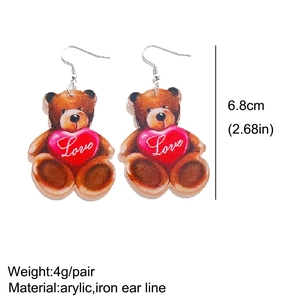 Cute brown teddy bear earrings holding a red love heart made of acrylic material