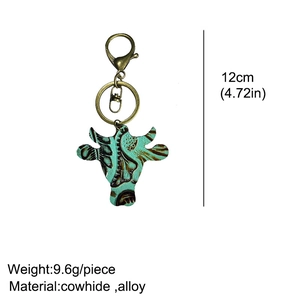 Detail of western bull head leather keychain showing 12cm size and bronze hardware