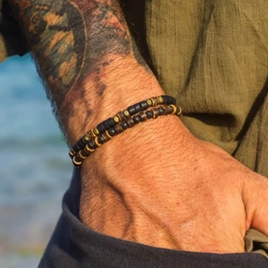 Mens stackable volcanic rock and wooden bead bracelets set with vintage metal spacers