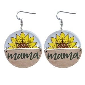 Acrylic sunflower earrings with wood texture circles and mama engraving on white backdrop