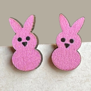 Close-up of cute pink glitter bunny studs for kids and women, Easter jewelry detail