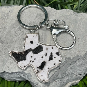 Texas state map leather keychain with cow print texture and silver lobster clasp