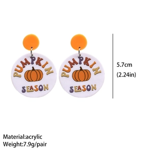 Detail view of pumpkin season acrylic earrings showing dimensions 5.7cm and 7.9g weight