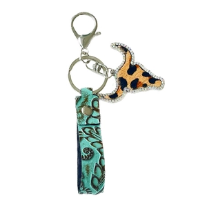 Western style cow skull keychain with leopard print and embossed turquoise leather wristband