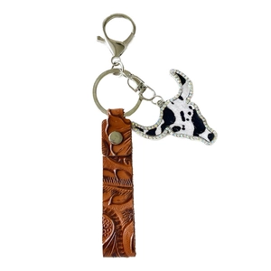 Western leather keychain with embossed pattern, cow skull charm and crystal accents