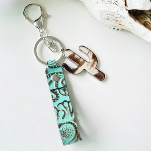 Western style faux fur cactus keychain with turquoise embossed leather strap and D-ring